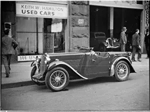 This image features a Singer car