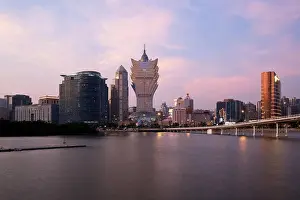 Image of Macau (Macao), China. Skyscraper hotel and casino building at downtown in Macau (Macao). Asian tourism, modern city life, or business finance