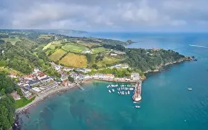 Image of Rozel Harbour at high tide with surrounding countryside