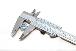 Gauge Prints: Image shows a close-up of a vernier caliper used for precise measurements in engineering