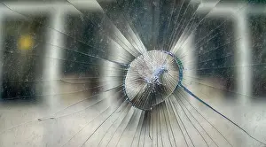 Fracture Prints: The impact of a stone in the windshield of a car