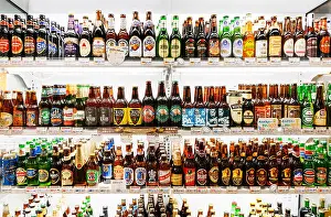 Shelves Prints: Imported beers on shelves in a Japanese beer store. Tokyo, Japan