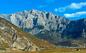 High Mountains Prints: The impressive Haut de Cry mountain range rises above the Rhône Valley