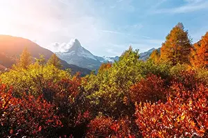 Incredible colorful sunrise on Grindjisee lake with Matterhorn Cervino peak in Swiss Alps. Zermatt resort location, Switzerland. Landscape photography