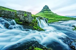 Incredible landscape with Kirkjufellsfoss waterfall and Kirkjufell mountain, Iceland, Europe