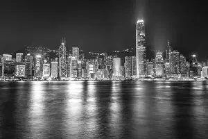 Commercial Hong Prints: The incredible night cityscape view of lights on the water on Victoria Harbour in Hong Kong