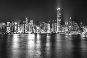 Kong Prints: The incredible night cityscape view of lights on the water on Victoria Harbour in Hong Kong