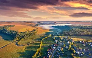 Incredible summer sunrise on Ternopil outskirts with asphalt road