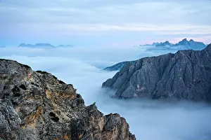 Auronzo Prints: Incredible sunrise landscape with flowing fog and dramatic skies in the Dolomites mountains
