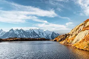 Incredible view of clear water and sky reflection on Chesery lake (Lac De Cheserys) in France Alps. Monte Bianco mountains range on background