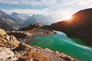 Incredible view of clear water and sky reflection on Lac Blanc lake in France Alps. Monte Bianco mountains range on background