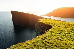 Incredible view of Sorvagsvatn lake on cliffs of Vagar island in sunset time, Faroe Islands, Denmark. Landscape photography