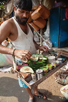 India, Bengal, Kolkata, Pan Vendor in Malik Ghat Flower Market, Kolkata