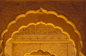 Jaisalmer Prints: India, Rajasthan, Jaisalmer. Intricately carved sandstone arches within cenotaphs at Bada Bagh