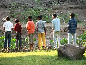 Asians Prints: Indian boys peeing in line in the wild