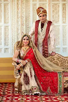 Young Couple Prints: Indian bride and groom in traditional wedding dress