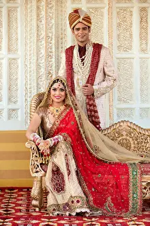 Young Couple Prints: Indian bride and groom in traditional wedding dress