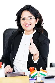 Evidence Prints: Indian Female Lawyer Showing Thumbs up Success