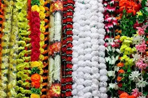 Indian flower decoration made of plastic flowers and in all kind of colors