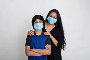 Face Mask Prints: Indian mother and son wearing Covid protection mask