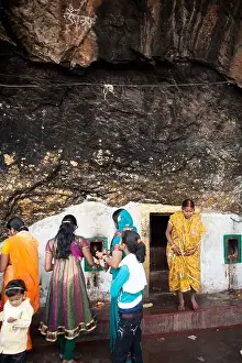 Indian pilgrims pray Buddhist sight Dungeshwari cave(Mahakala caves), Bodh Gaya, Bihar, India