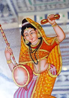 String Instrument Prints: Indian poetess Mirabai singing bhajan and playing musical instrument ektara India