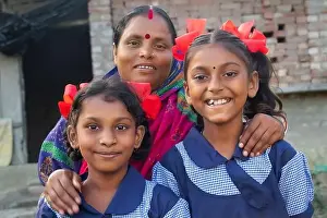 Villager Prints: indian village government school girls looking at each other while mother standing beside