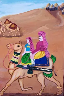 Indian Culture Prints: Indian Wall Painting depicting a man and woman in traditional Indian dress riding a camel in the desert