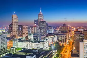 Indianapolis, Indiana, USA downtown city skyline with the State House at dusk