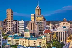 Indianapolis, Indiana, USA downtown city skyline with the State House at dusk