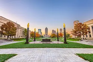 Indianapolis, Indiana, USA monuments and downtown skyline at dusk