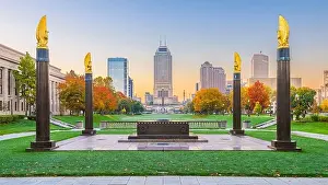 Indianapolis, Indiana, USA monuments and downtown skyline at dusk