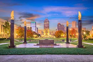Indianapolis, Indiana, USA monuments and downtown skyline at dusk