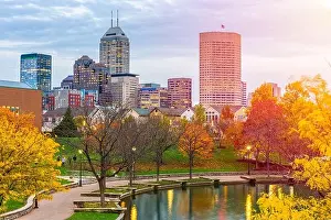 Indianapolis, Indiana, USA river walk and skyline at dusk in the evening