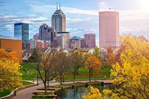 Indianapolis, Indiana, USA river walk and skyline at dusk in the evening