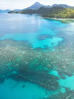 Anambas Islands Prints: Indonesia Anambas Islands - Drone view Telaga Island coast line with shipwreck