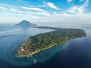 Indonesia Bunaken - Drone view Bunaken Island with coral reef and Manadotua Island