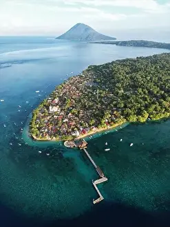 Aerial Shot Prints: Indonesia Bunaken - Drone view Bunaken Island with coral reef and Manadotua Island