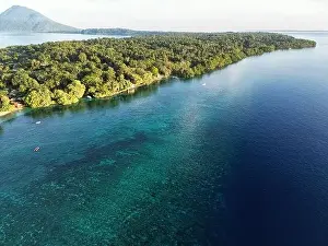 Manadotua Island Prints: Indonesia Bunaken - Drone view Bunaken Island with coral reef and Manadotua Island