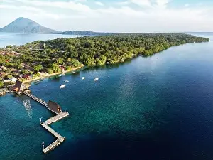 Indonesia Bunaken - Drone view Bunaken Island with coral reef and Manadotua Island