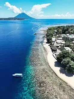 Indonesia Bunaken - Drone view Siladen Island with coral reef