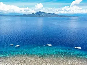 Indonesia Bunaken - Drone view Siladen Island with coral reef