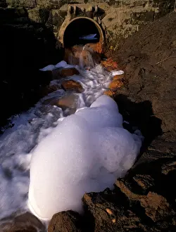 Water Quality Prints: Industrial Effluent of Chemical Pollution issuing from Outfall from Factory Widnes Merseyside UK