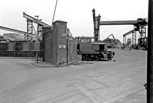 East End Prints: An industrial shunter stands at the entrance to the Ward Ferrous Metals scrapyard in Silvertown
