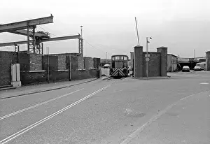 East End Prints: An industrial shunter stands at the entrance to the Ward Ferrous Metals scrapyard in Silvertown