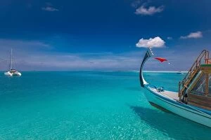 Images Dated 16th December 2018: Inspirational Maldives beach design. Maldives traditional boat Dhoni