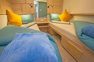 Bedsheet Prints: Interior of cabin bedroom on luxury sailing yacht with twin beds