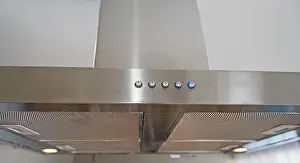 Furnishing Prints: Interior design decor showing modern cooker hood extractor fan appliance in luxury apartment showroom