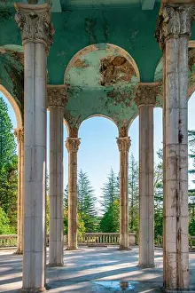 Decayed Prints: Interior view of neoclassical colonnade with tall stone pillars