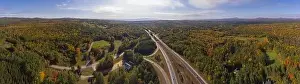 Park Range Prints: Interstate Highway 93 at Exit 22 with NH Route 127 in White Mountain National Forest panorama aerial view with fall